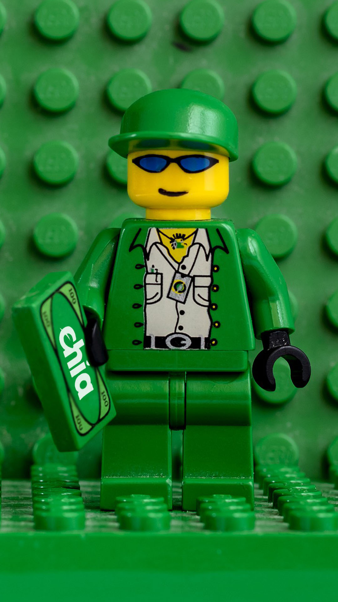 A lego farmer toy with a chia coin